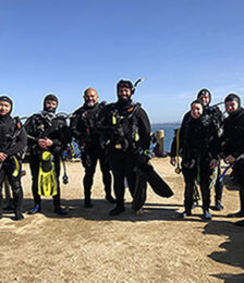 Scuba Fusion staff posing selfie at the Break Water San Carlos Beach Monterey